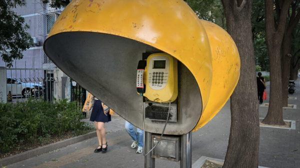 A public payphone in China began ringing and ringing. Who was calling?